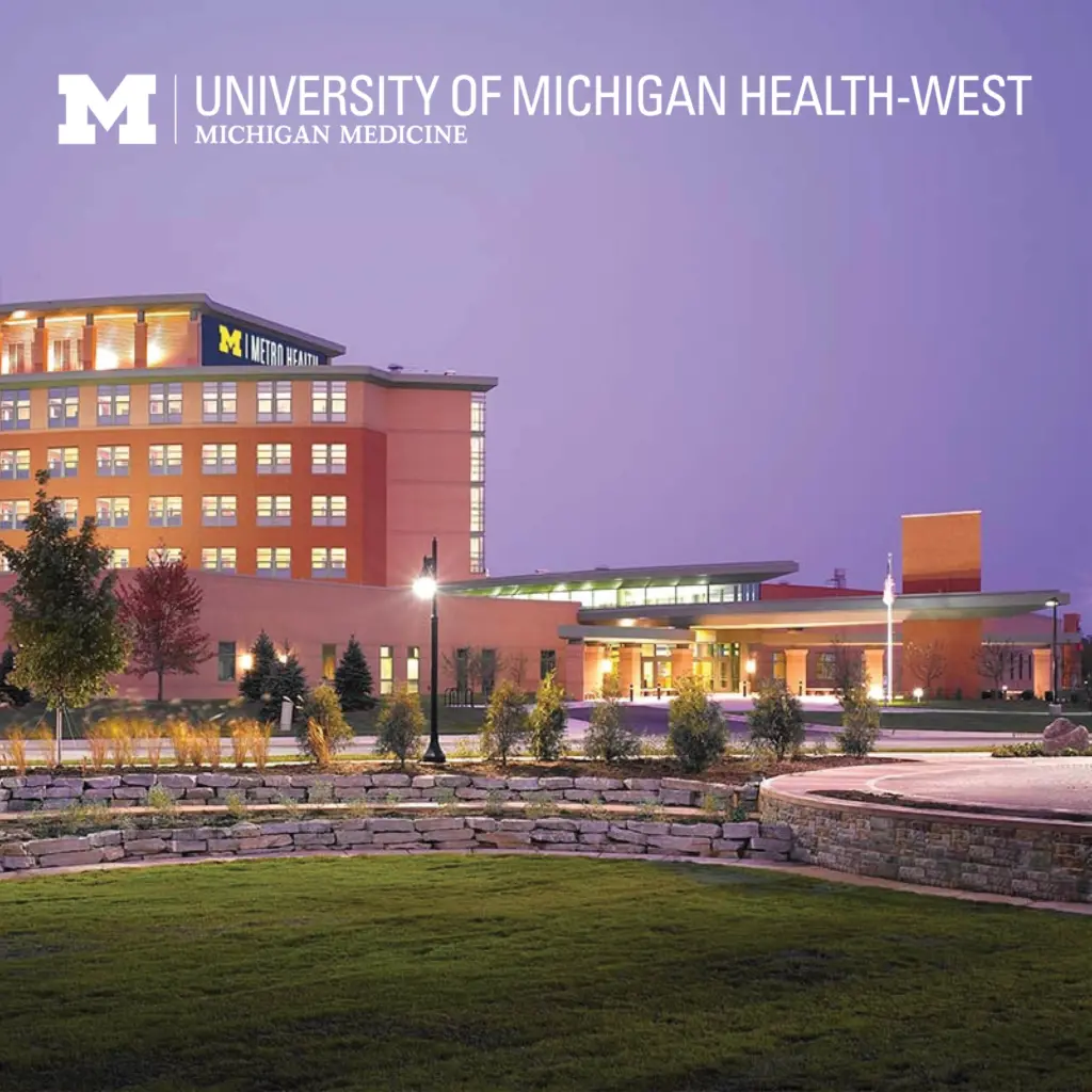 Image of the Metro Health University of Michigan Health-West building. Text and the top left corner reads “Metro Health University of Michigan Health-West” with the logo to the left.