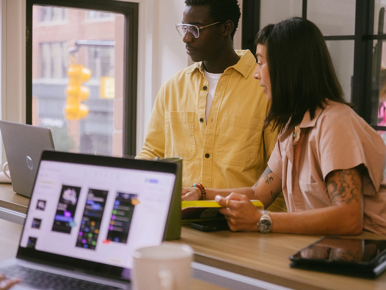 UX/UI designers collaborating on a user interface project