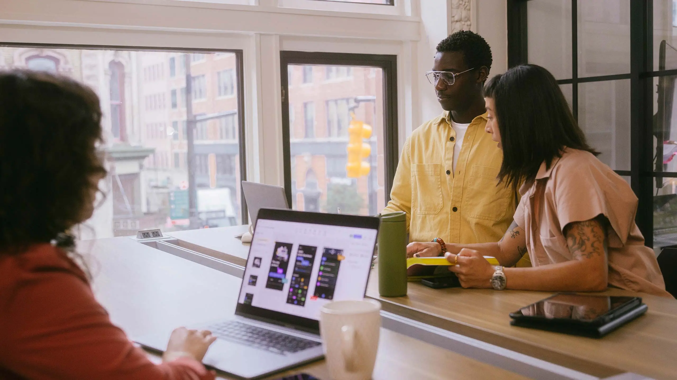 Design team working on experience design for mobile app