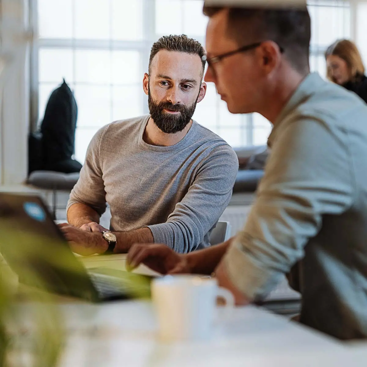 Diverse entrepreneurs and small business owners working in coworking space.Programmers and software engineers working in office