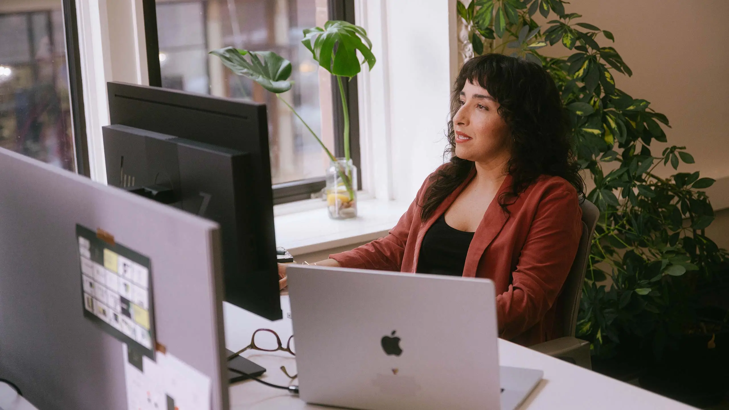 Data analytics team member working at desk